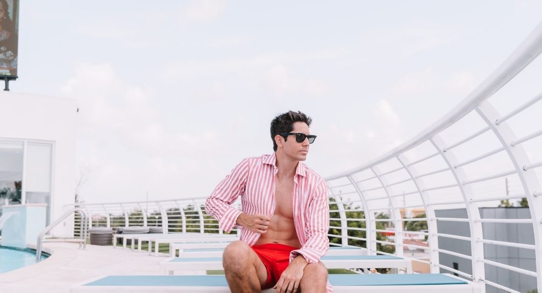 man in nuvo suites rooftop pool hotel in miami