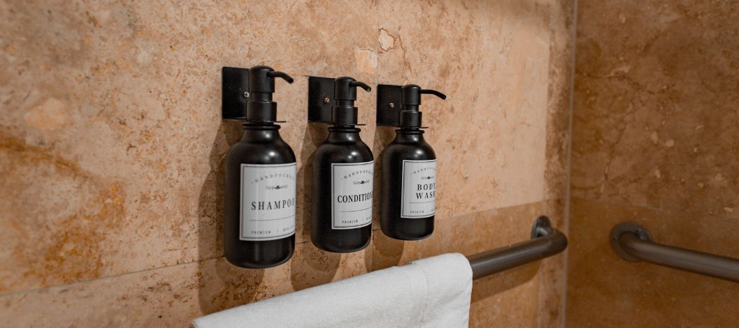 shampoo and conditioner bottles of the shower