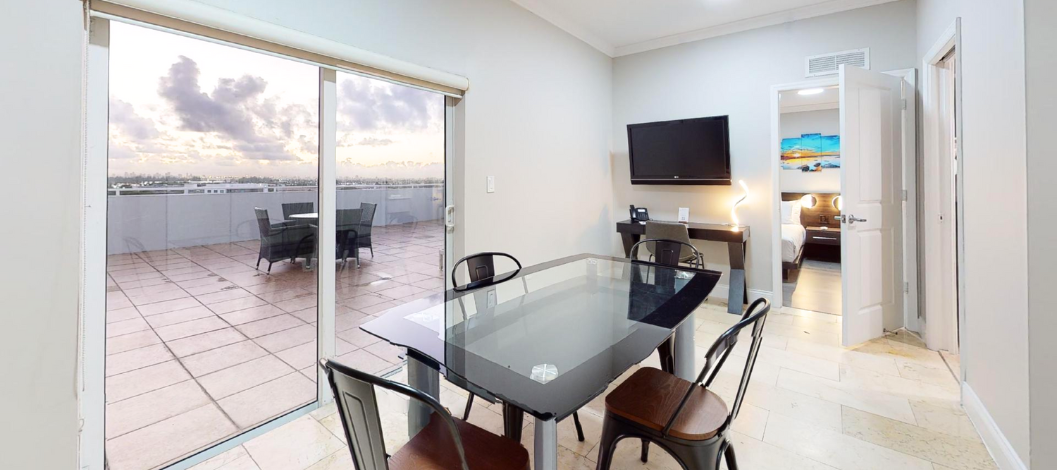 View of the double bed suite with terrace where terrace and living room are visible